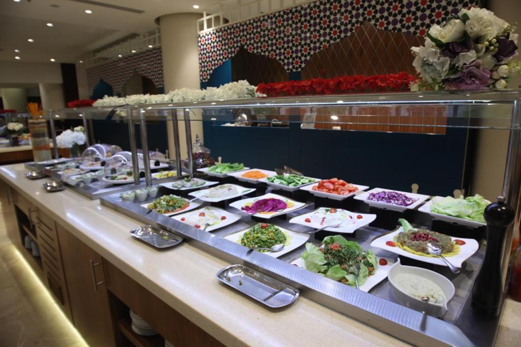 Holiday Suites Al Azizia Mecca Exterior photo A buffet at a luxury hotel in Antalya, Turkey