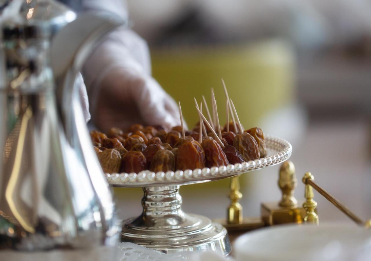 Holiday Suites Al Azizia Mecca Exterior photo Dates are a traditional food in the Middle East.
