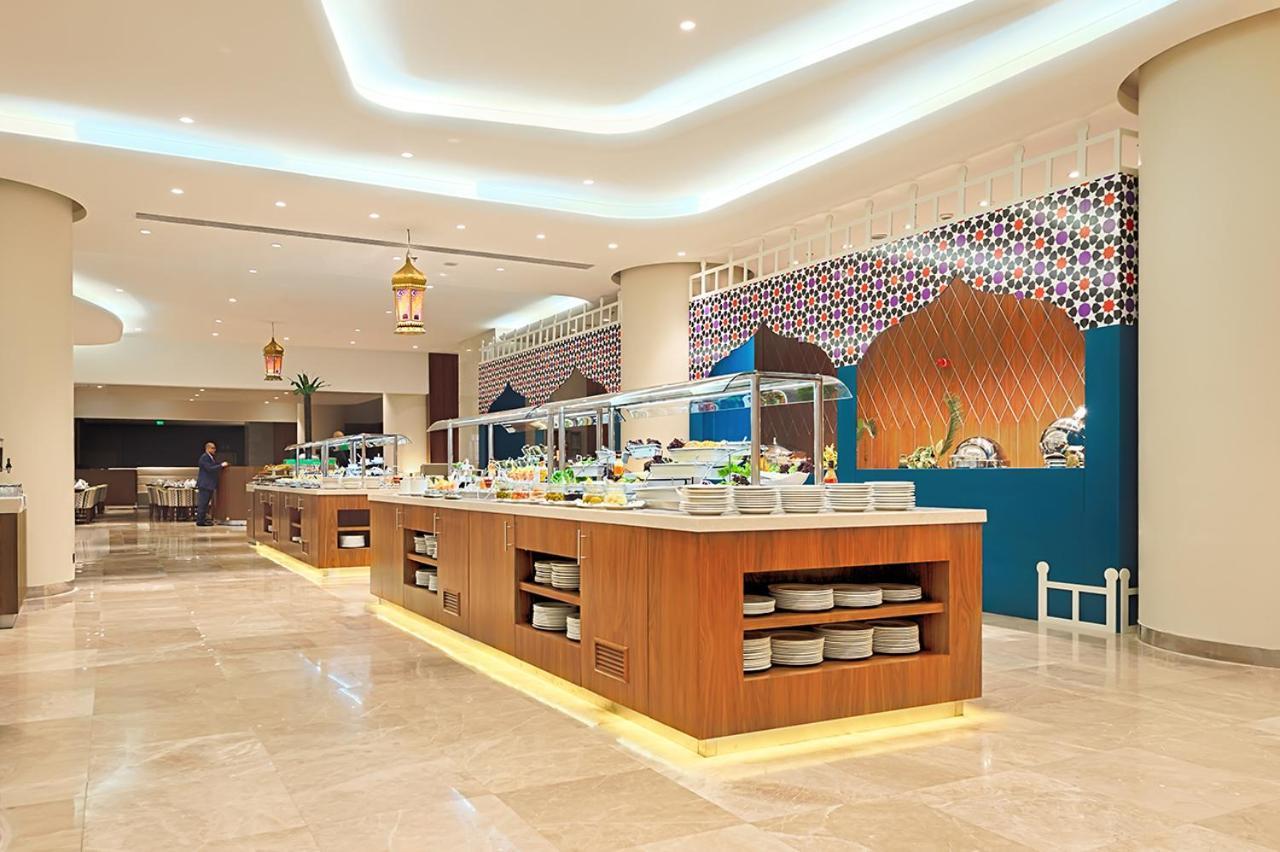 Holiday Suites Al Azizia Mecca Exterior photo The hotel's restaurant