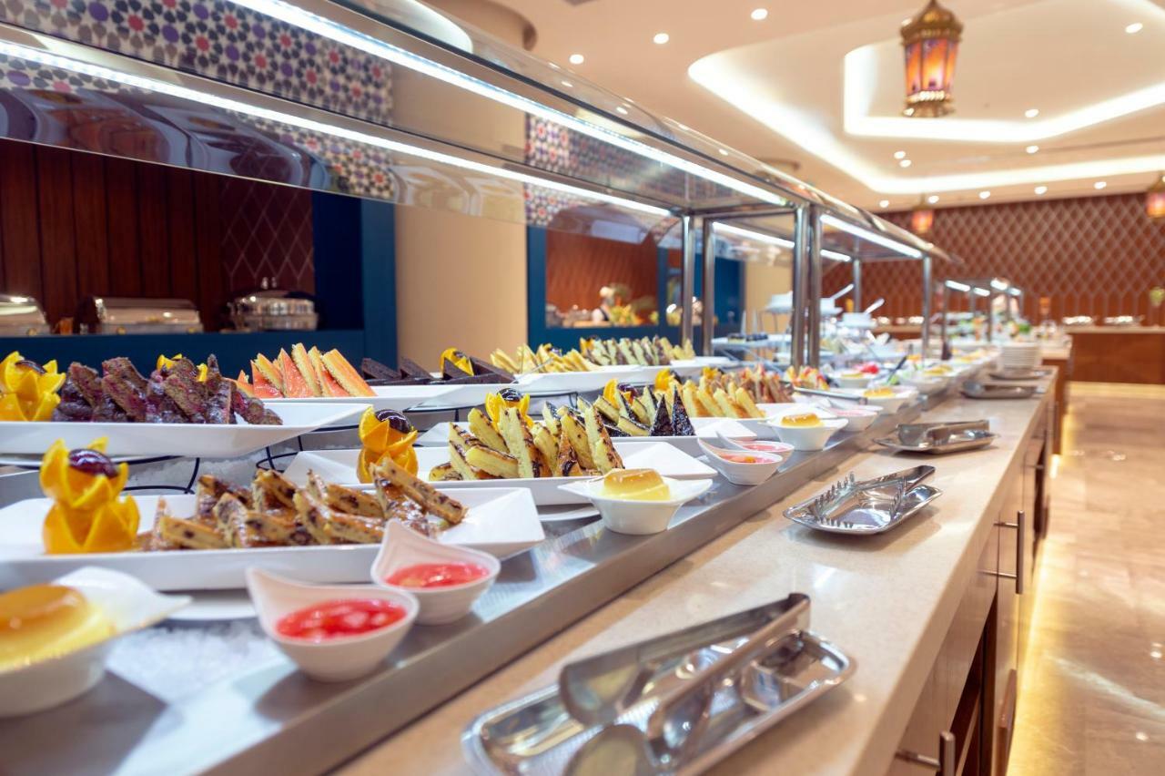 Holiday Suites Al Azizia Mecca Exterior photo Buffet at the hotel